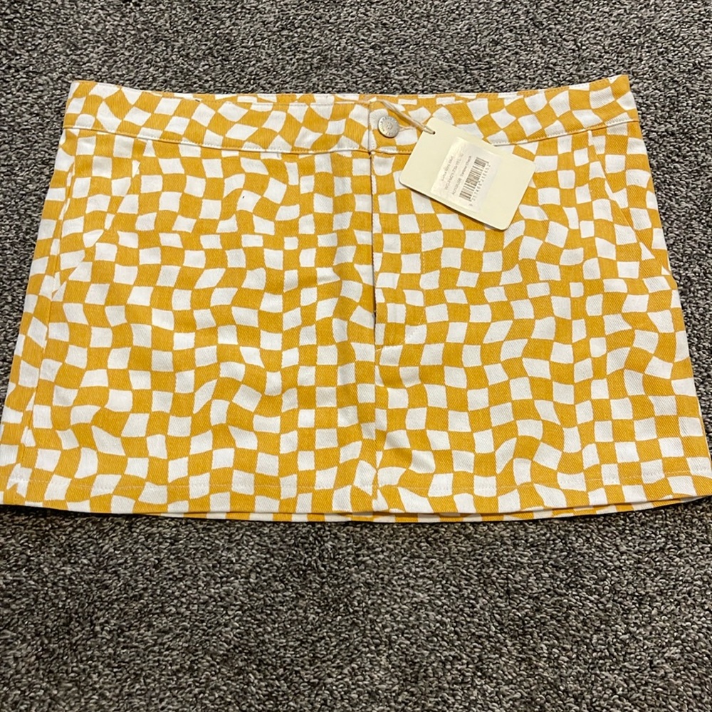 Yellow and white mini skirt